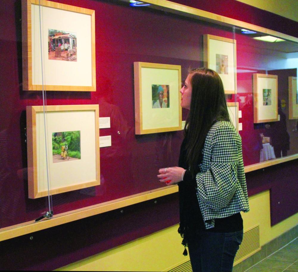 GVL / Emma Moulton

Kaylie Miller views the Life in Uganda exhibit at the Red Wall Gallery