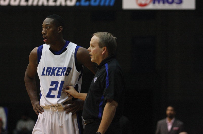 GVL / Robert Mathews
Head coach Ric Wesley  talking to senior Tyrone Lee