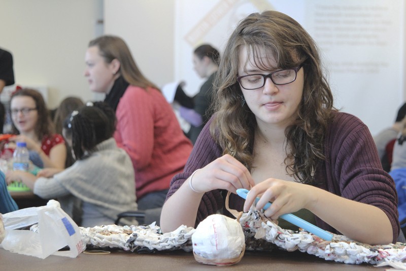 GVL / Jessica Hollenbeck

Sophomore Jessi Brown works to crochet plastic bags into blankets as part of the GVSU Upcycling event as part of the MLK Day Celebration.