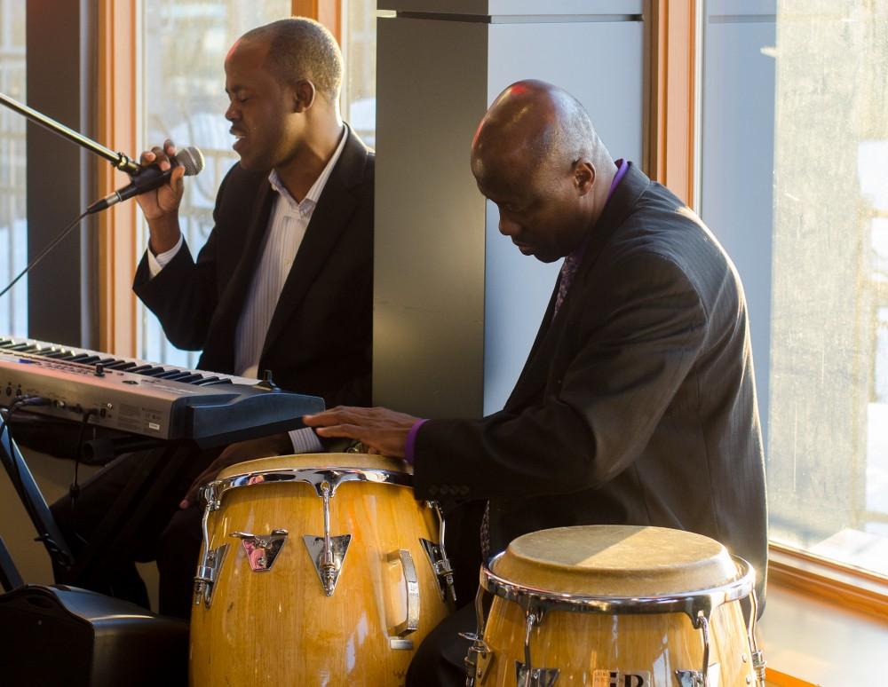 GVL/Jessica Hollenbeck

Wilney Pierre and Andrema Jean perform during the Haitian Cuisine Night at the Connection on Sunday