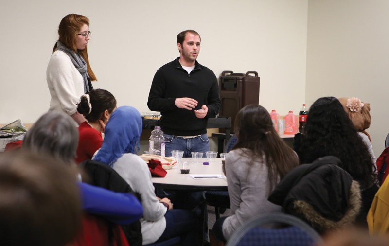 GVL / Robert MathewsGVSU students Lucy Keller (left) and Noah Zucker (right) speaking during Avi Shabbat. 