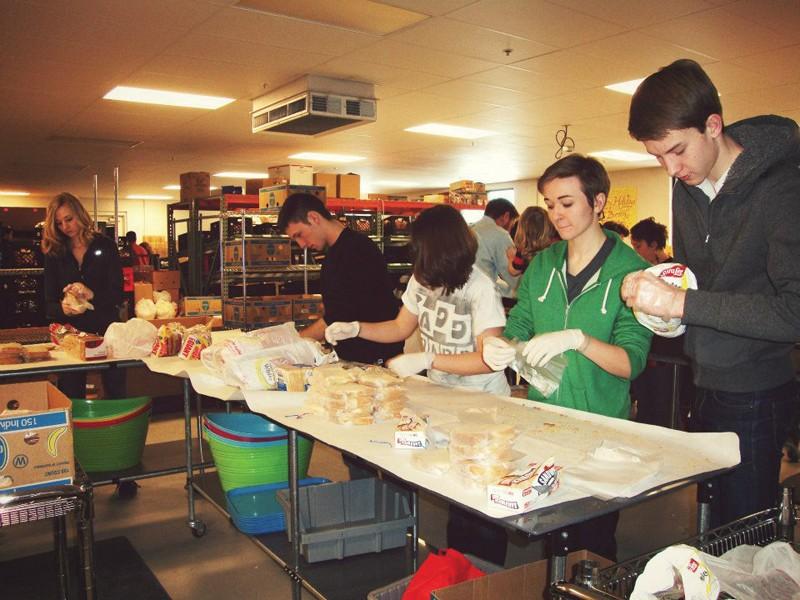 Couretsy / Hunger and Homelessness of GVSU
GVSU students volunteering at the Kids Food Basket in downtown Grand Rapids.