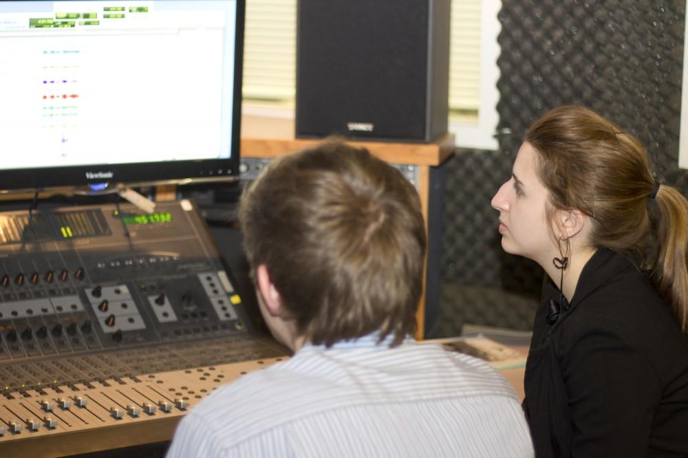 GVL / Amanda GreenwoodStudents Ryan Rakowski and Noel Stojkov learn about recording in Grand Valleys School of Communications sound studio