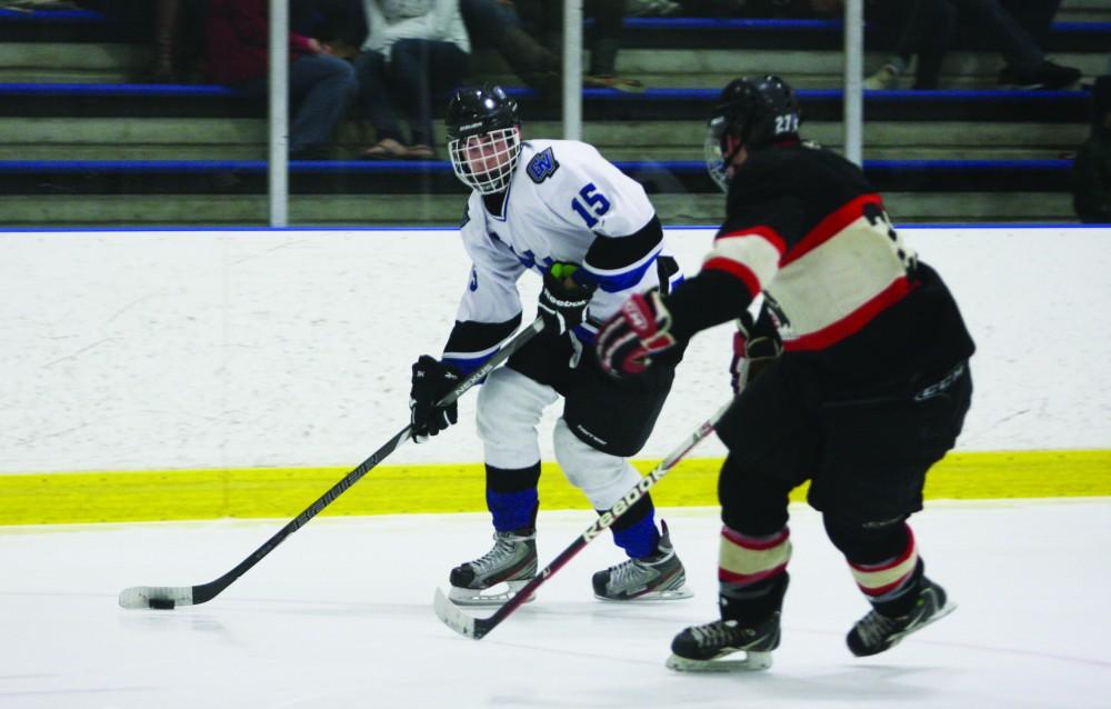 GVL / ArchiveSophomore Jacob Endicott taking the puck down the ice during a previous match against Southern Illinois University.
