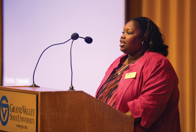 GVL / Robert MathewsTakeelia Garrett-Lynn, head of the scholarship commitee, presents the 2013 Positive Black  Womens Scholarship award. 