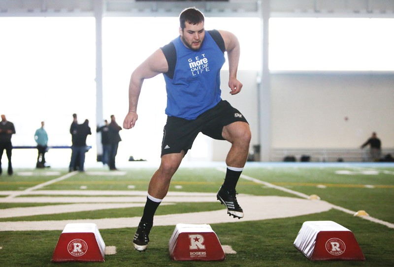 GVL / Robert Mathews
Offensive lineman Tim Lelito running drills during the 2013 NFL Pro Day at the Kelly Family Sports Center. 