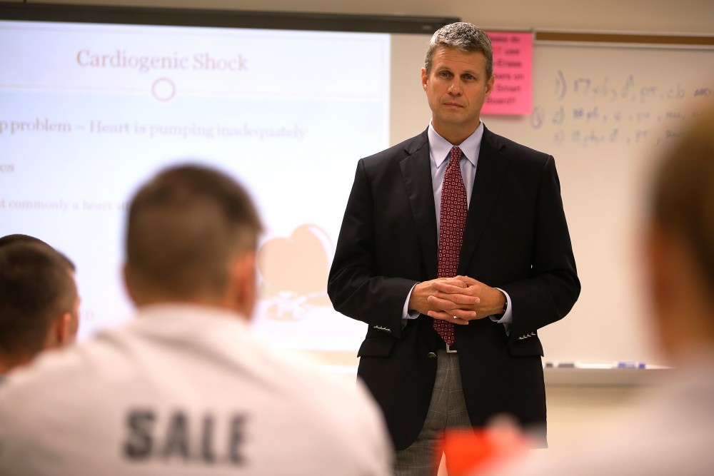 GVL / Robert Mathews
U.S. Rep. Bill Huizenga speaking with venterans taking part in the Military Police Basic Training Program hosted at Grand Valley State University.