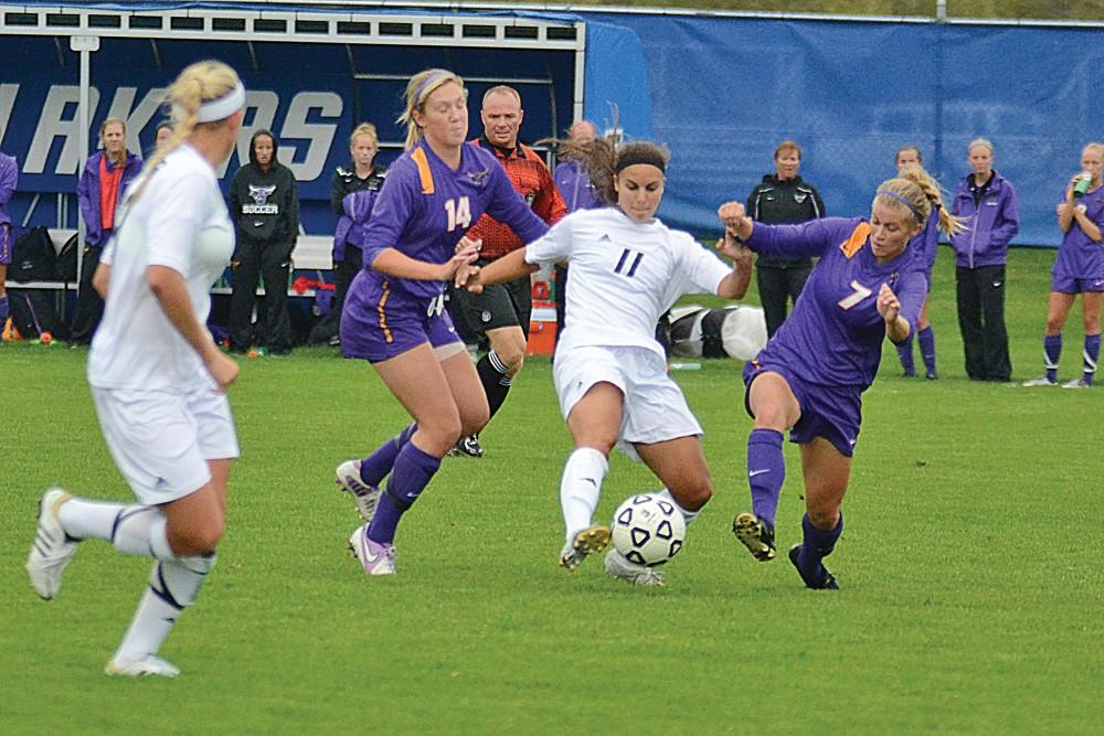 GVL / Hannah MicoSenior Tayler Ward steals the ball away from a Minnesota State University player. 