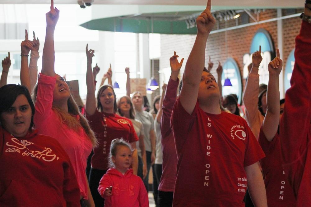 GVL / Emily Frye 
Eyes Wide Open group members performing their flash mob routine in Kirkhof Center on Friday afternoon.