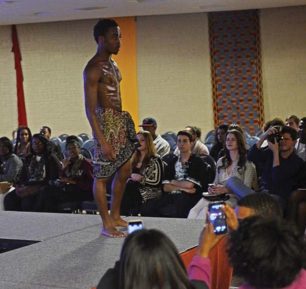 GVL/Kevin Sielaff
Lakeith Chavers sports traditional African body paint during the African Student Council's Aspire to Inspire Weekend. The OGE: Fashion Royals of Africa show took place in Kirkoff Center's Grand River Room this past friday.