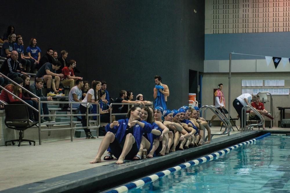 GVL / Mohamed Azuz
Swimmers cheer on their team mates at a meet earlier this season.