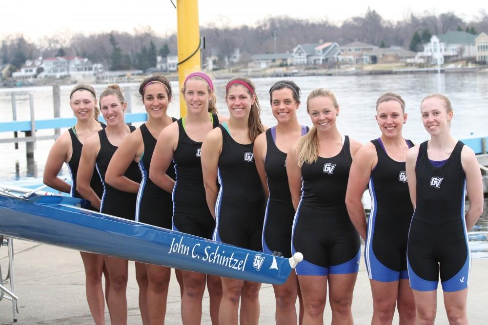 Courtesy / John BancheriThe GVSU womens rowing team poses by their newly christened vessel, the John C. Schintzel. The team later took the boat on its maiden voyage