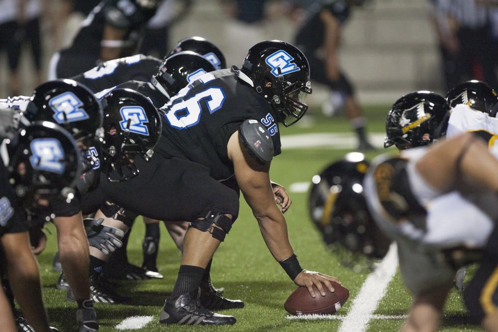 	Who dat?: GVSU center Matt Armstrong (#56) snaps the ball against Michigan Tech. Armstrong agreed to terms as a free agent with the New Orleans Saints on Saturday night.