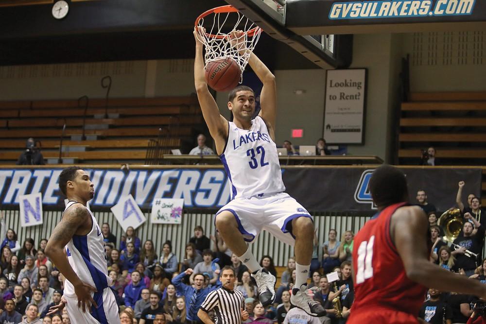 GVL / Robert MathewsRicardo Carbajal finishing off a dunk during the Lakers loss to Saginaw Valley State. 