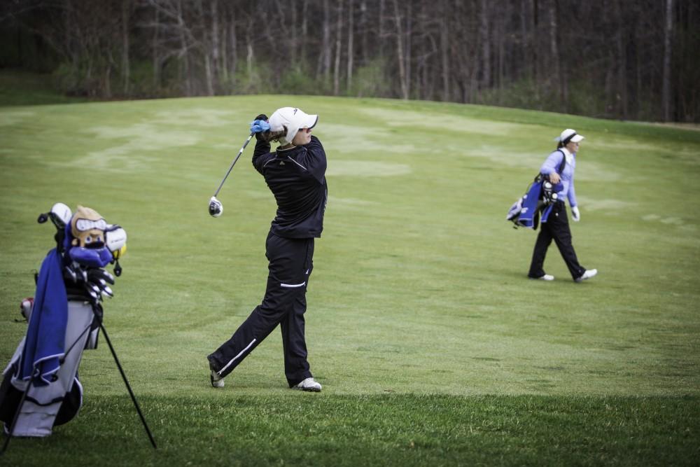 GVL/Spencer MillerGabrielle Shipley (junior) hits the ball onto the green as she prepares for regionals during a practice on April 30th, 2015.
