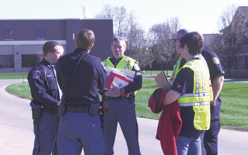 GVL/Audra Gamble 
Eleven different emergency response teams practice a radiology drill Tuesday, April 18, 2015 at Grand Valley State Universitys Allendale Campus. The drills tooks place within North B living center near the entrance to campus.  