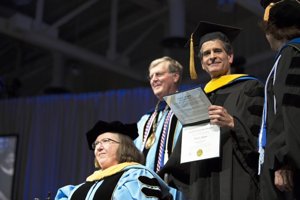 GVL / Kevin Sielaff
Dean Kamen, renowned inventor and entrepreneur, is honored with a degree during convocation. Grand Valley kicks off the academic year with their annual convocation ceremonies, held August 29th, 2015 inside the Fieldhouse Arena.  