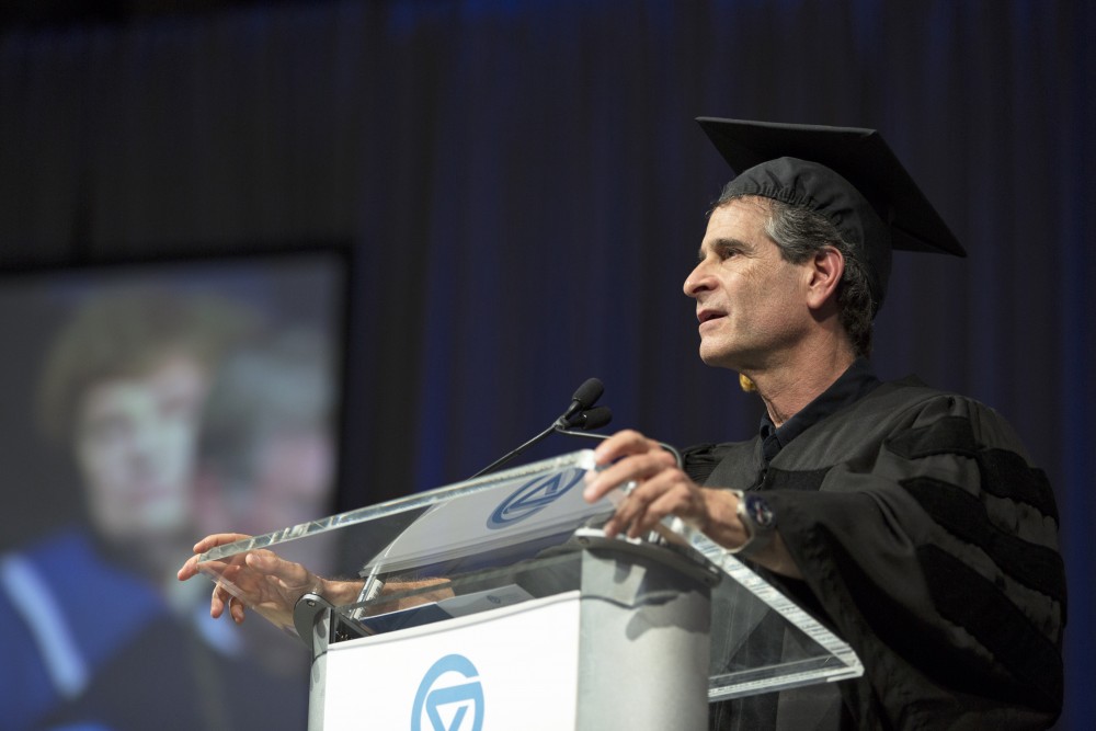 GVL / Kevin Sielaff
Dean Kamen, renowned inventor and entrepreneur, speaks during convocation. Grand Valley kicks off the academic year with their annual convocation ceremonies, held August 29th, 2015 inside the Fieldhouse Arena.  