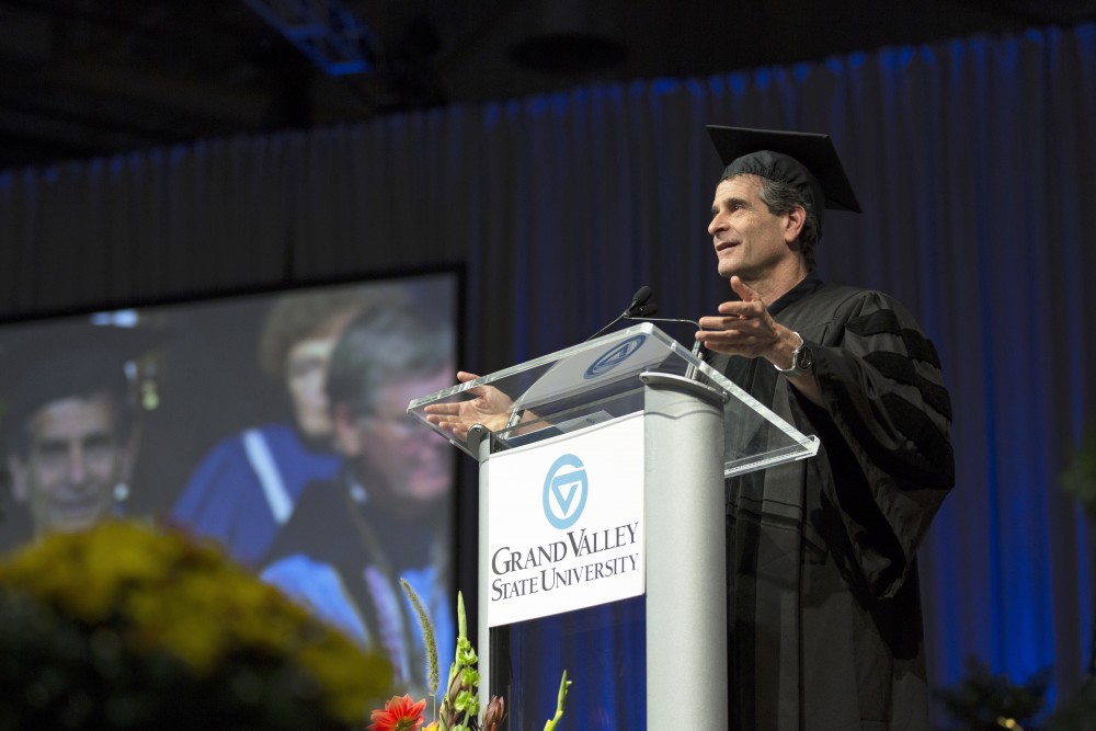 GVL / Kevin Sielaff
Dean Kamen, renowned inventor and entrepreneur, speaks during convocation. Grand Valley kicks off the academic year with their annual convocation ceremonies, held August 29th, 2015 inside the Fieldhouse Arena.  