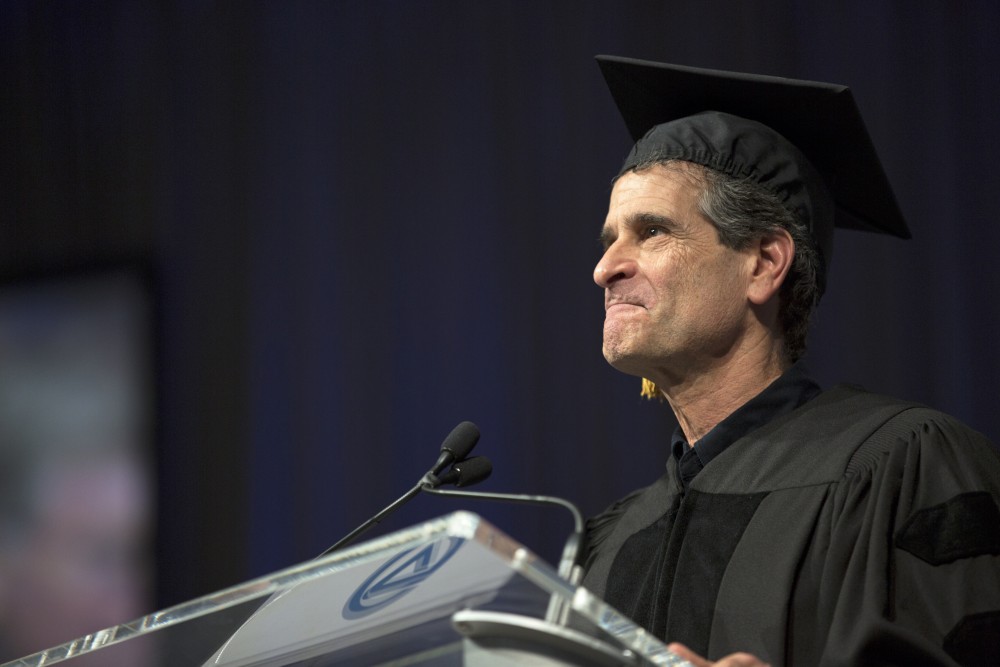 GVL / Kevin Sielaff
Dean Kamen, renowned inventor and entrepreneur, speaks during convocation. Grand Valley kicks off the academic year with their annual convocation ceremonies, held August 29th, 2015 inside the Fieldhouse Arena.  