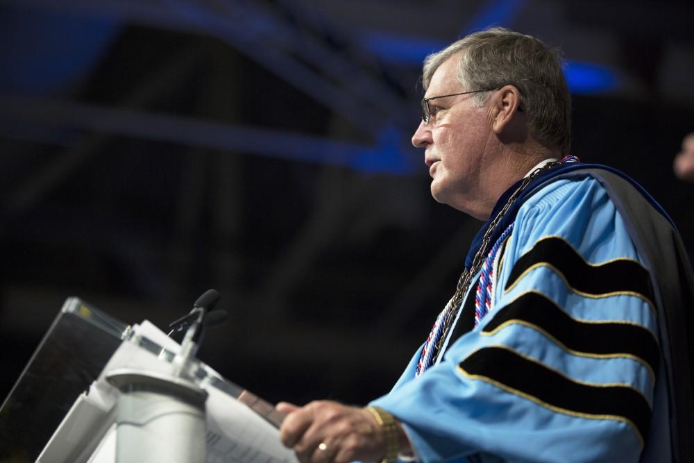 GVL / Kevin Sielaff
President Thomas Haas speaks during convocation. Grand Valley kicks off the academic year with their annual convocation ceremonies, held August 29th, 2015 inside the Fieldhouse Arena.  