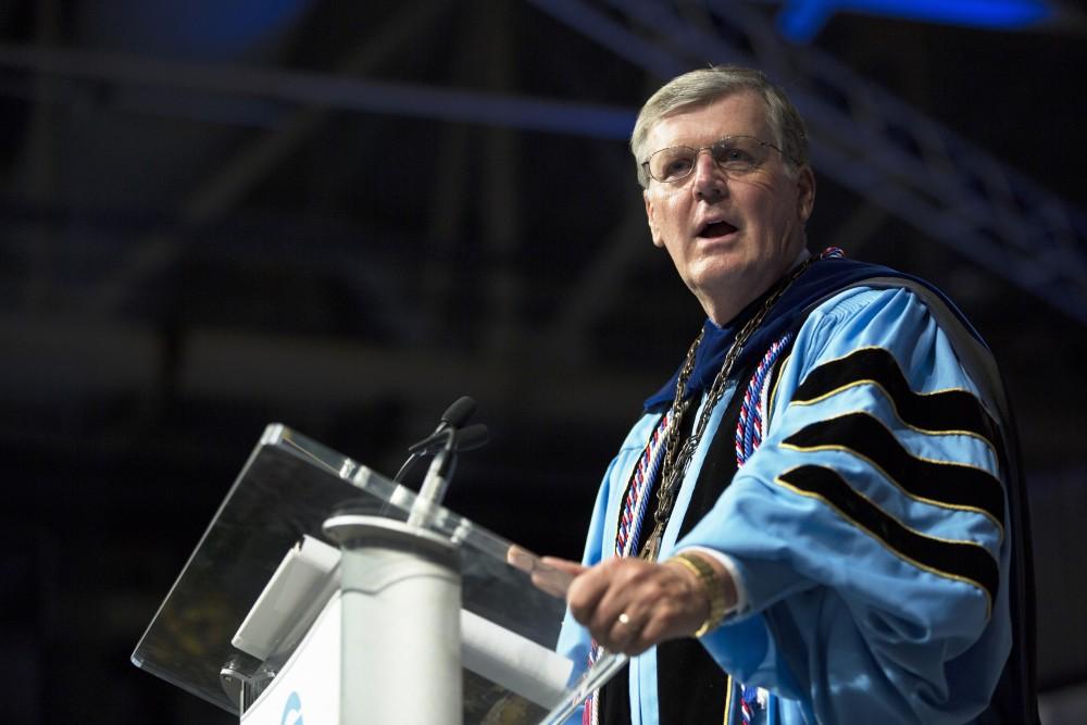 GVL / Kevin Sielaff
President Thomas Haas speaks during convocation. Grand Valley kicks off the academic year with their annual convocation ceremonies, held August 29th, 2015 inside the Fieldhouse Arena.  