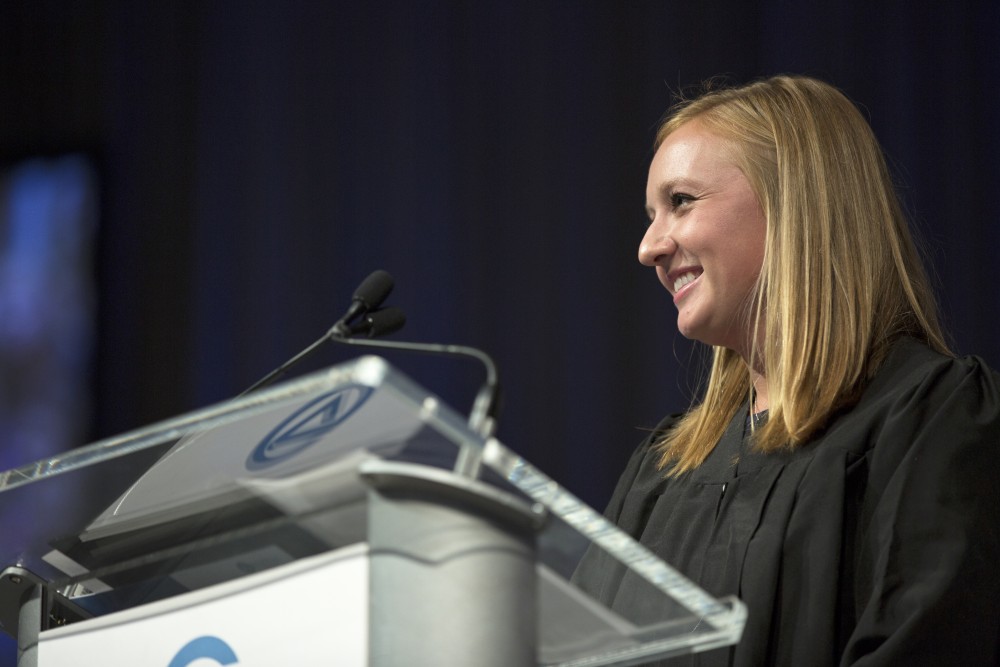 GVL / Kevin Sielaff
Student body president Maddie Cleghorn speaks during convocation. Grand Valley kicks off the academic year with their annual convocation ceremonies, held August 29th, 2015 inside the Fieldhouse Arena.  