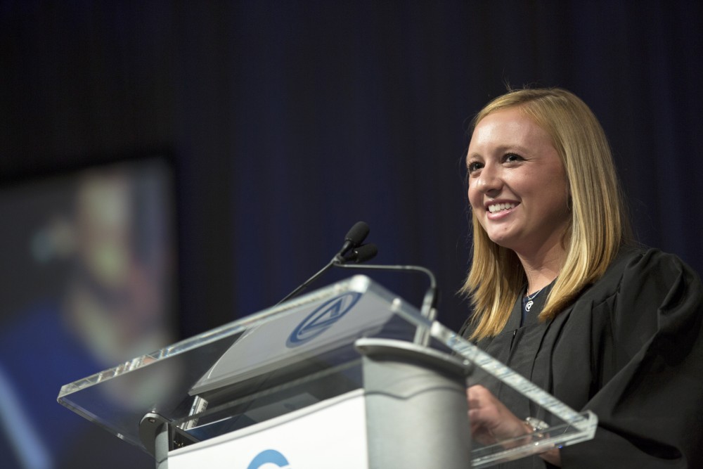 GVL / Kevin Sielaff
Student body president Maddie Cleghorn speaks during convocation. Grand Valley kicks off the academic year with their annual convocation ceremonies, held August 29th, 2015 inside the Fieldhouse Arena.  