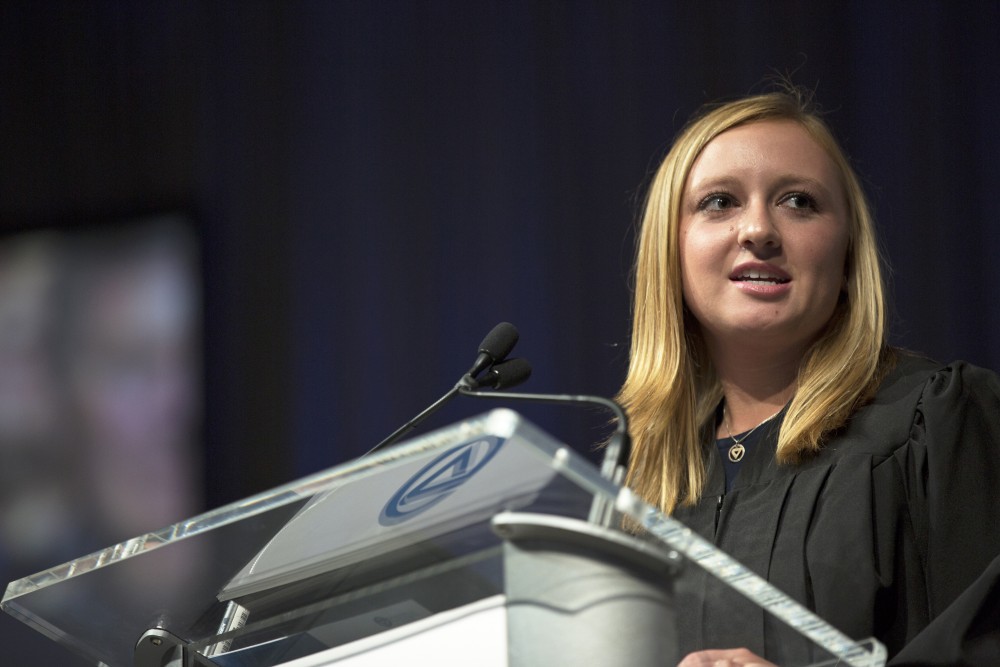 GVL / Kevin Sielaff
Student body president Maddie Cleghorn speaks during convocation. Grand Valley kicks off the academic year with their annual convocation ceremonies, held August 29th, 2015 inside the Fieldhouse Arena.  