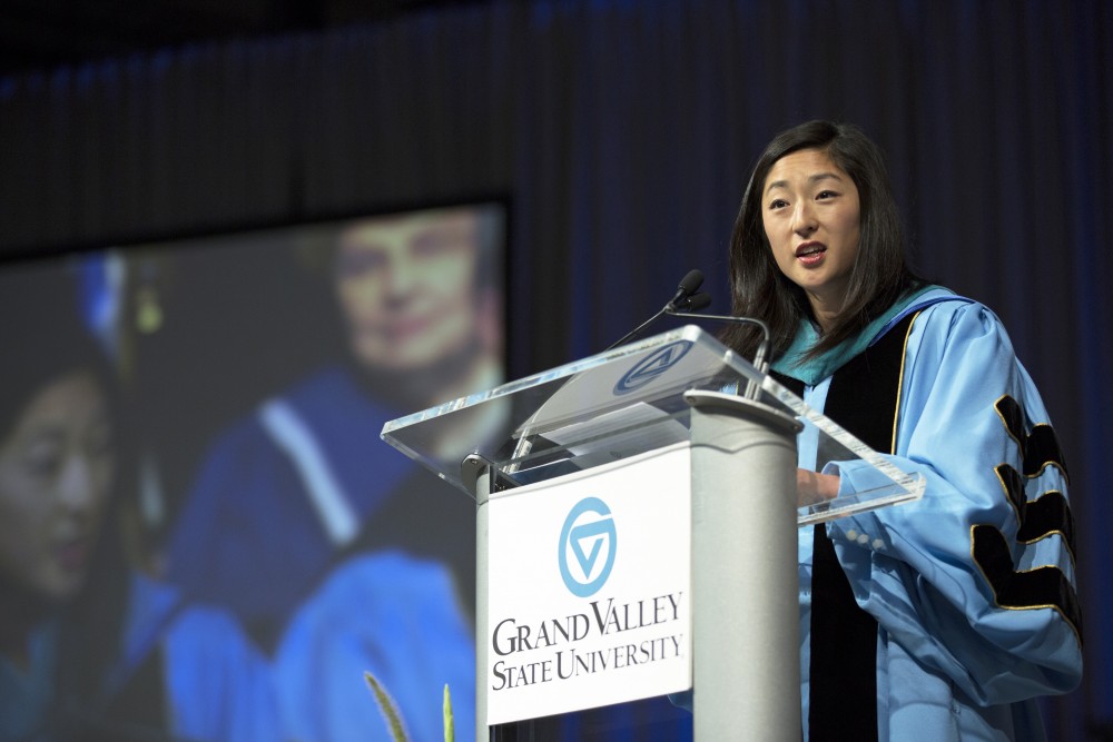 GVL / Kevin Sielaff
Megan S. Sall, member of Grand Valley's board of trustees, speaks at convocation. Grand Valley kicks off the academic year with their annual convocation ceremonies, held August 29th, 2015 inside the Fieldhouse Arena.  