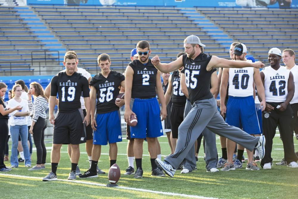 GVL / Kevin Sielaff
Brian Moran (85) attempts a field goal during Fan Fest. The Grand Valley State University athletics department hosts its annual Fan Fest at Lubbers Stadium Thursday, August 28th, 2015. Incoming freshman and athletes alike swarm the football field for games and activities in a "meet and greet" setting. 