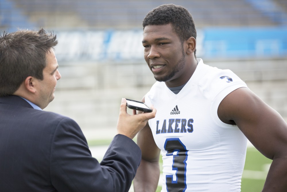 GVL / Kevin Sielaff
The Grand Valley State University football squad gathers for its annual media day Wednesday, August 19th, 2015. The afternoon aimed to promote the highly anticipated 2015 football season, while also making predictions for what the year ahead might hold. Wide receiver Brandon Bean (3) answers questions from media providers.  