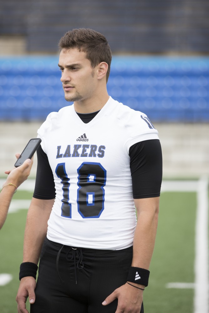 GVL / Kevin Sielaff
The Grand Valley State University football squad gathers for its annual media day Wednesday, August 19th, 2015. The afternoon aimed to promote the highly anticipated 2015 football season, while also making predictions for what the year ahead might hold. Ollie Ajami (18), quarterback, speaks to the media.   