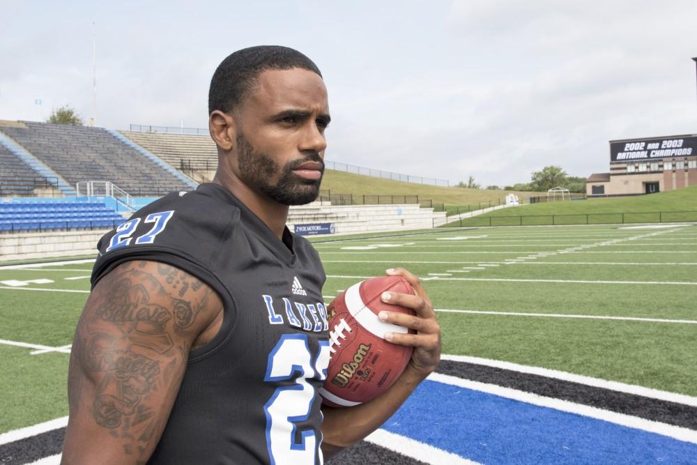 GVL / Kevin Sielaff
The Grand Valley State University football squad gathers for its annual media day Wednesday, August 19th, 2015. The afternoon aimed to promote the highly anticipated 2015 football season, while also making predictions for what the year ahead might hold.  Senior running back Kirk Spencer (27) poses for his final media day photos.   