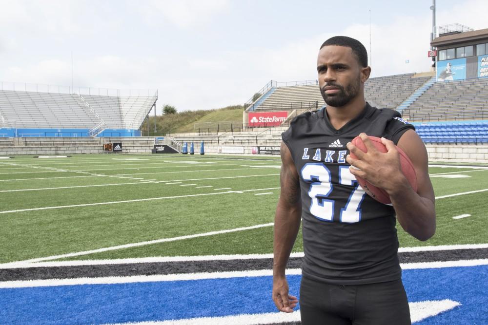 GVL / Kevin Sielaff
The Grand Valley State University football squad gathers for its annual media day Wednesday, August 19th, 2015. The afternoon aimed to promote the highly anticipated 2015 football season, while also making predictions for what the year ahead might hold.  Senior running back Kirk Spencer (27) poses for his final media day photos.   