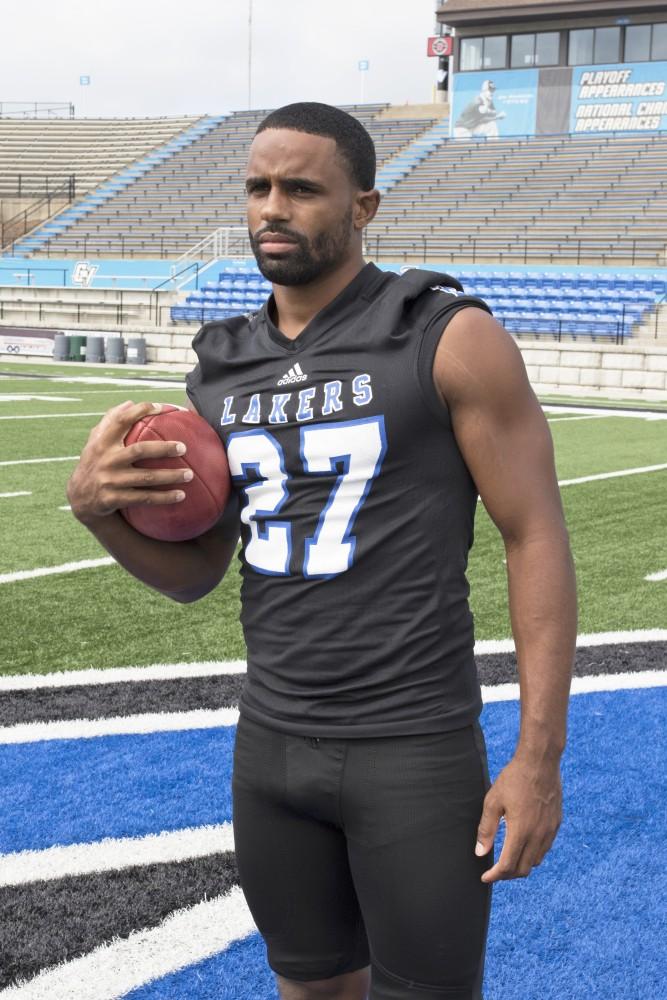 GVL / Kevin Sielaff
The Grand Valley State University football squad gathers for its annual media day Wednesday, August 19th, 2015. The afternoon aimed to promote the highly anticipated 2015 football season, while also making predictions for what the year ahead might hold.  Senior running back Kirk Spencer (27) poses for his final media day photos.   