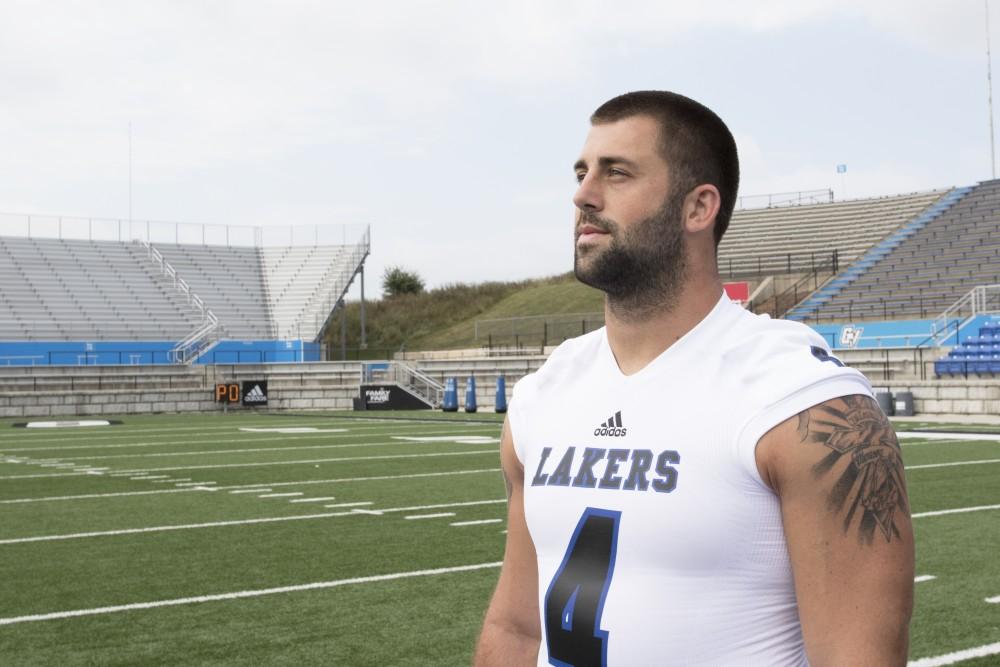 GVL / Kevin Sielaff
The Grand Valley State University football squad gathers for its annual media day Wednesday, August 19th, 2015. The afternoon aimed to promote the highly anticipated 2015 football season, while also making predictions for what the year ahead might hold. Alton Voss (4) poses for a media day photo.   