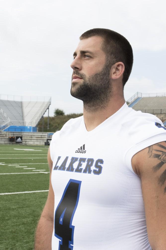 GVL / Kevin Sielaff
The Grand Valley State University football squad gathers for its annual media day Wednesday, August 19th, 2015. The afternoon aimed to promote the highly anticipated 2015 football season, while also making predictions for what the year ahead might hold. Alton Voss (4) poses for a media day photo.      