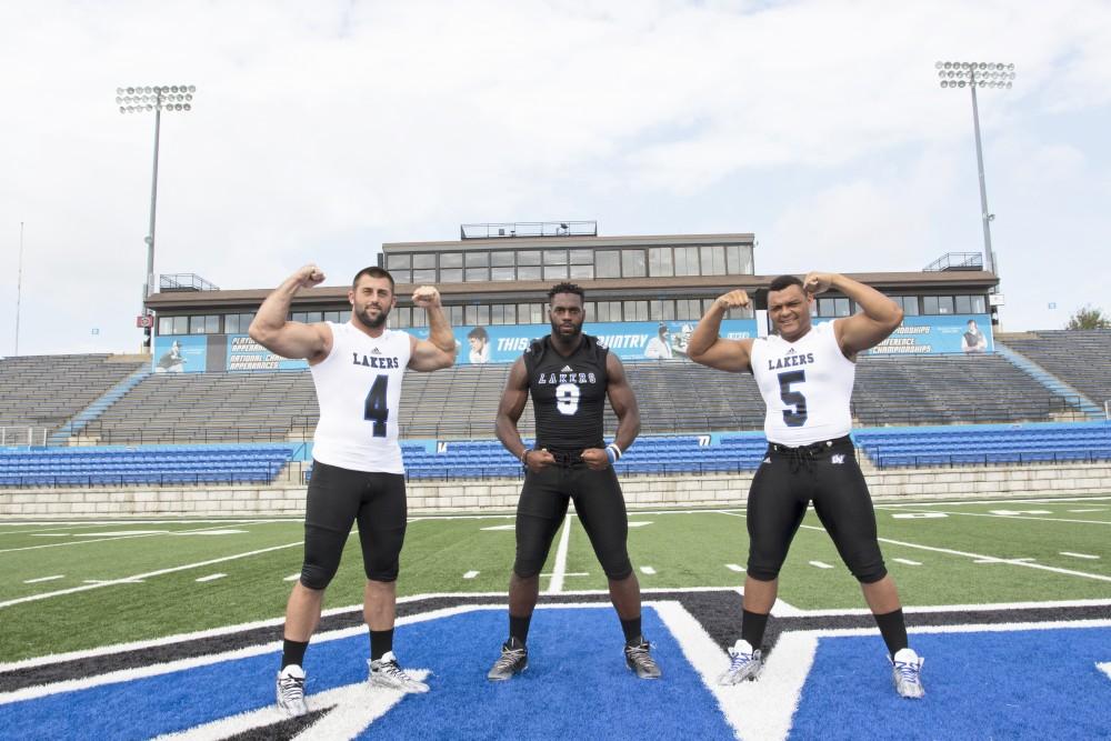 GVL / Kevin Sielaff
The Grand Valley State University football squad gathers for its annual media day Wednesday, August 19th, 2015. The afternoon aimed to promote the highly anticipated 2015 football season, while also making predictions for what the year ahead might hold. Alton Voss (4), Matt Judon (9), and De'Ondre Hogan (5) all pose for a media day photo.   