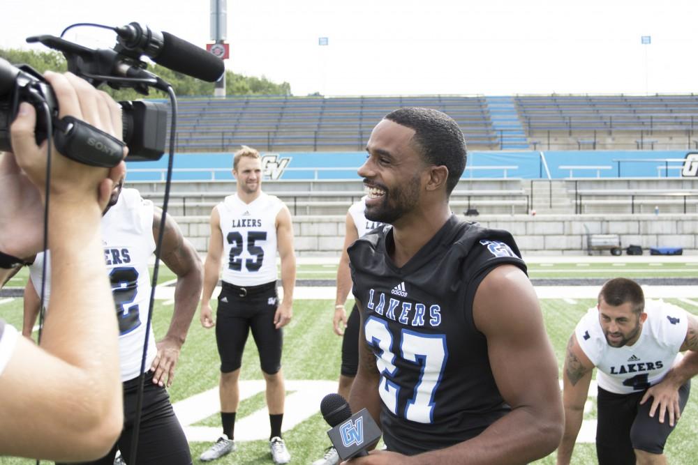 GVL / Kevin Sielaff
The Grand Valley State University football squad gathers for its annual media day Wednesday, August 19th, 2015. The afternoon aimed to promote the highly anticipated 2015 football season, while also making predictions for what the year ahead might hold. Kirk Spencer (27) does a TV outro for Grand Valley's sports info department.     