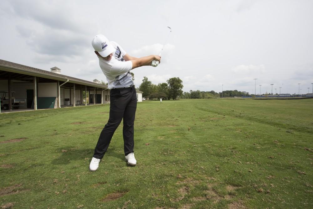 GVL / Kevin Sielaff
Freshman Mitchell White takes a swing down range Friday, August 28th, 2015.