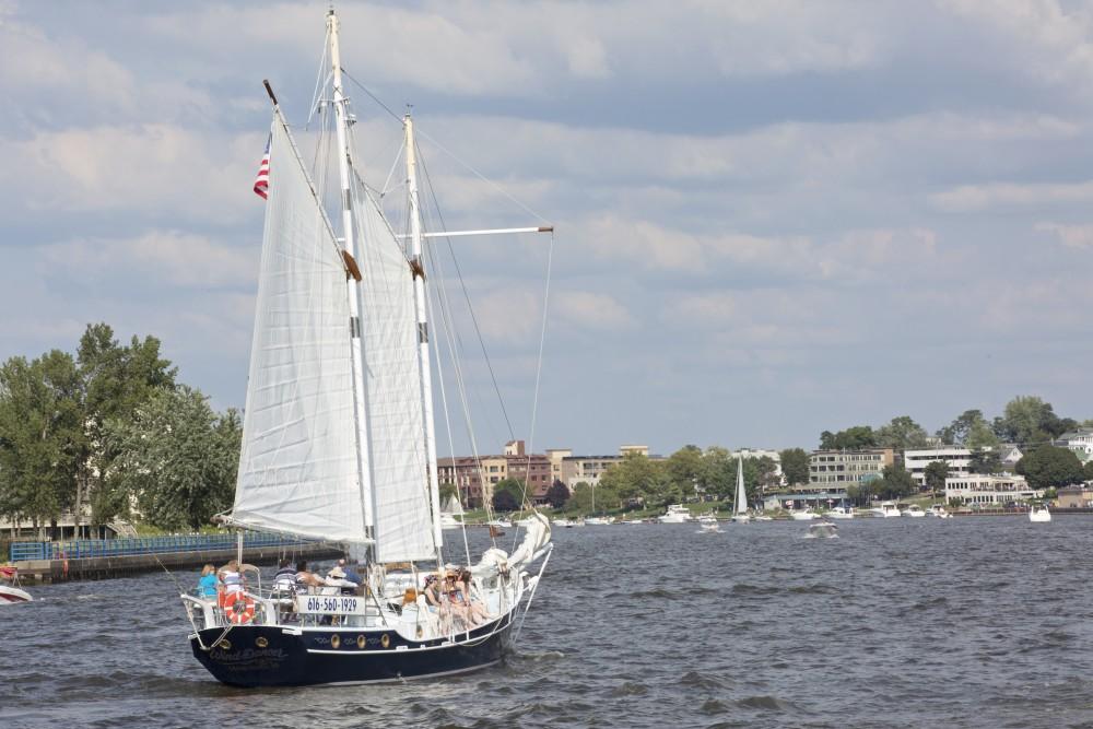 GVL / Kevin Sielaff    
Grand Haven State Park reaches its peak tourism season during mid-August as visitors benefit from the last of the summer's sun and waves - Saturday, August 22nd, 2015 drew massive crowds due to a cloudless sky and warm water temperatures. 