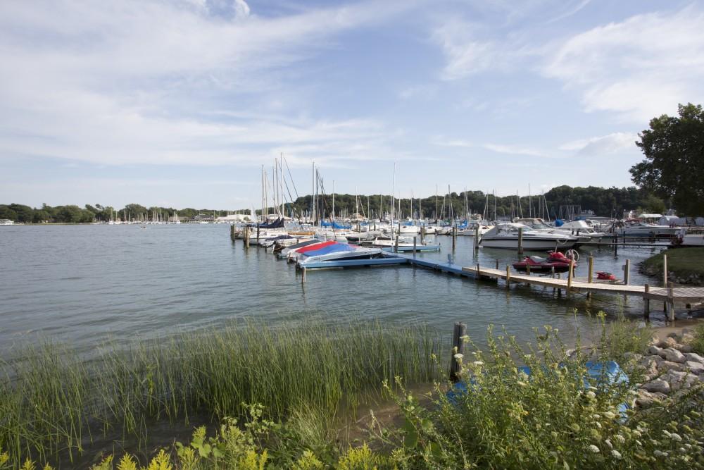 GVL / Kevin Sielaff  
Holland State Park, known for its fishing, boating, and proximity to Lake Macatawa, provides several marinas where owners can dock their various vehicles throughout the day. With a high of nearly 77 degrees, Saturday, August 22nd, 2015 proved to be a busy day at the park. 