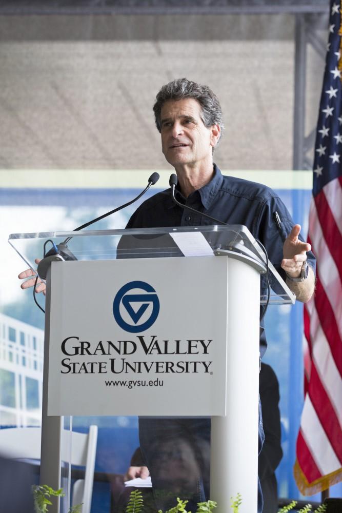 GVL / Kevin Sielaff
Dean Kamen, founder and president of DEKA Research and Development Corp., speaks before the new science hall. Grand Valley celebrates the P. Douglas Kindschi Hall of Science with a dedication ceremony Friday, August 28th, 2015. The dedication recognized both Grand Valley and state officials that made the realization of this building possible. 