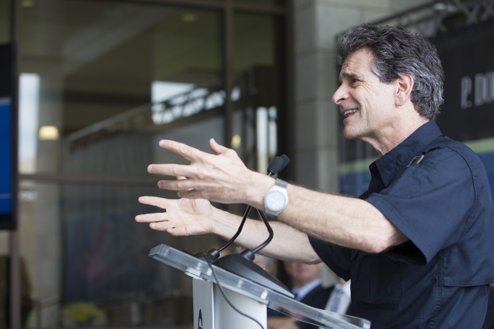 GVL / Kevin Sielaff
Dean Kamen, founder and president of DEKA Research and Development Corp., speaks before the new science hall. Grand Valley celebrates the P. Douglas Kindschi Hall of Science with a dedication ceremony Friday, August 28th, 2015. The dedication recognized both Grand Valley and state officials that made the realization of this building possible. 