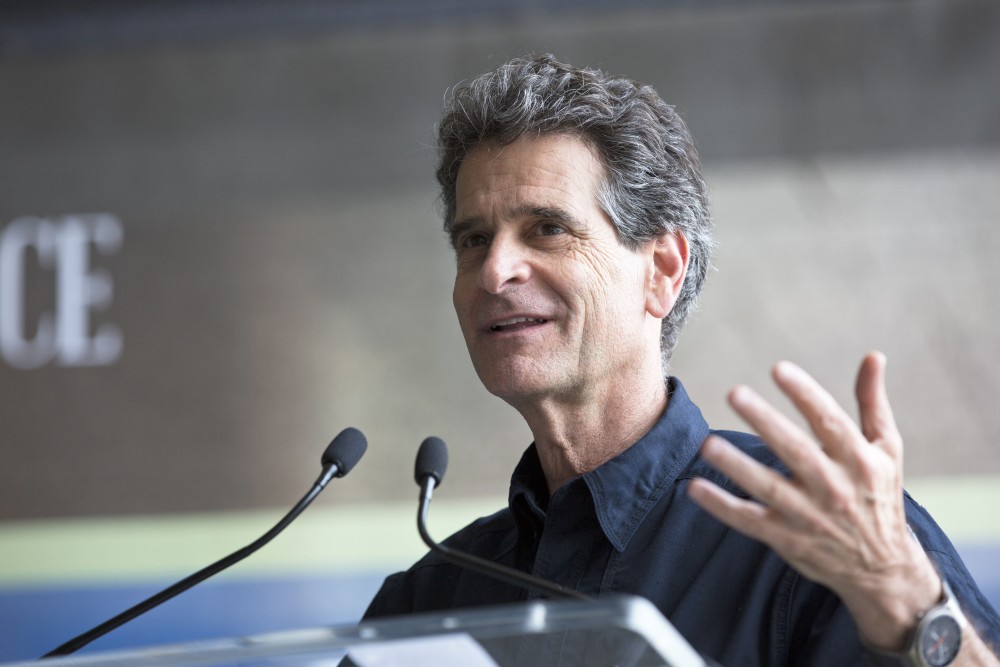 GVL / Kevin Sielaff
Dean Kamen, founder and president of DEKA Research and Development Corp., speaks before the new science hall. Grand Valley celebrates the P. Douglas Kindschi Hall of Science with a dedication ceremony Friday, August 28th, 2015. The dedication recognized both Grand Valley and state officials that made the realization of this building possible. 