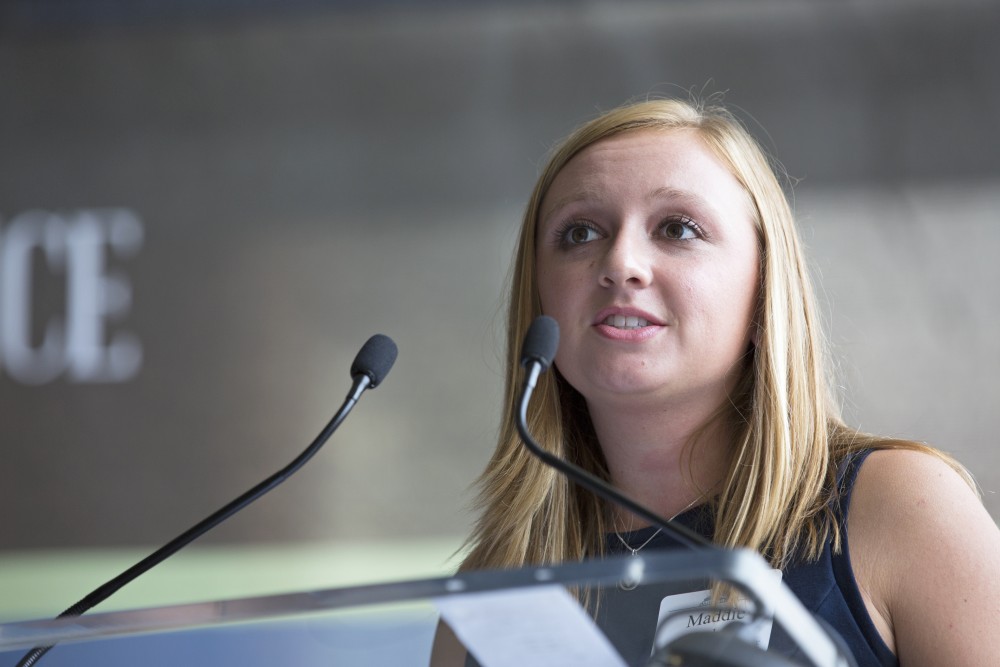 GVL / Kevin Sielaff
Student body president Maddie Cleghorn speaks in front of the new science building. Grand Valley celebrates the P. Douglas Kindschi Hall of Science with a dedication ceremony Friday, August 28th, 2015. The dedication recognized both Grand Valley and state officials that made the realization of this building possible. 