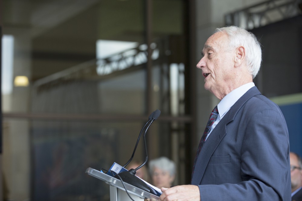 GVL / Kevin Sielaff
Former dean of math and sciences, P. Douglas Kindschi, speaks before the Kindschi Hall of Science. Grand Valley celebrates the P. Douglas Kindschi Hall of Science with a dedication ceremony Friday, August 28th, 2015. The dedication recognized both Grand Valley and state officials that made the realization of this building possible. 