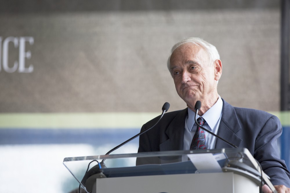 GVL / Kevin Sielaff
Former dean of math and sciences, P. Douglas Kindschi, speaks before the Kindschi Hall of Science. Grand Valley celebrates the P. Douglas Kindschi Hall of Science with a dedication ceremony Friday, August 28th, 2015. The dedication recognized both Grand Valley and state officials that made the realization of this building possible. 