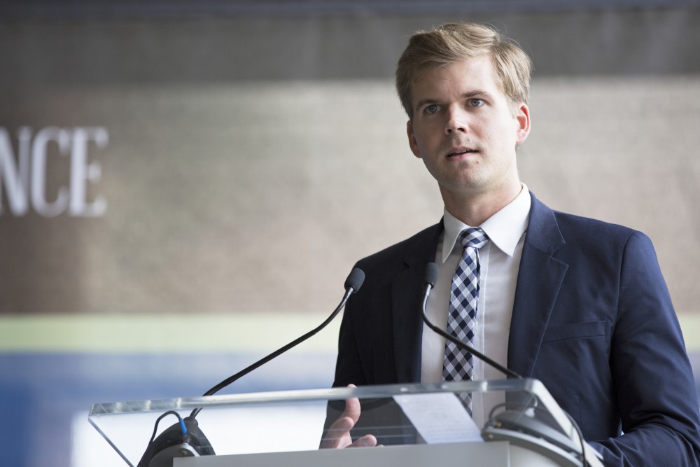 GVL / Kevin Sielaff
Vice chair of the Capital Outlay Subcommittee Adam Zemke speaks before the crowd. Grand Valley celebrates the P. Douglas Kindschi Hall of Science with a dedication ceremony Friday, August 28th, 2015. The dedication recognized both Grand Valley and state officials that made the realization of this building possible. 